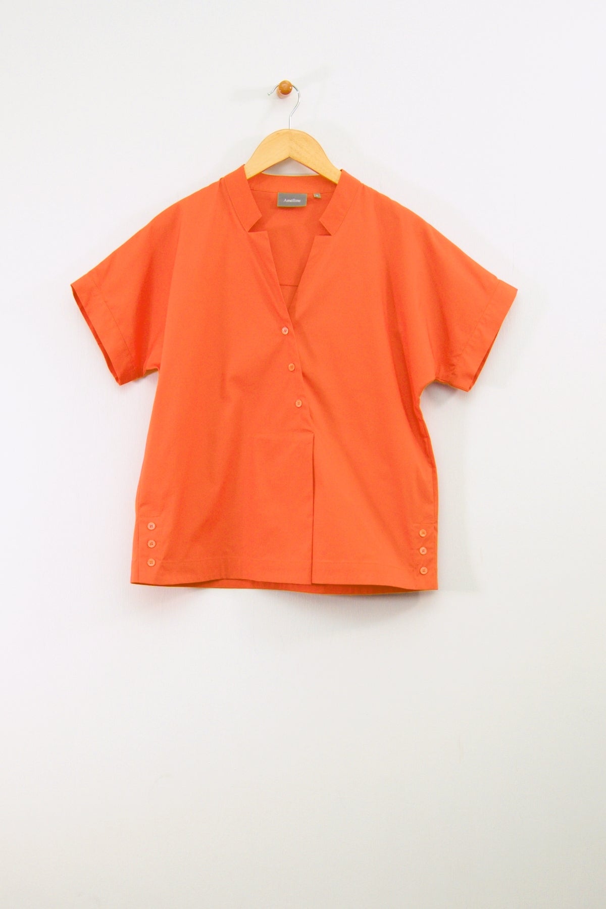 25" Cropped Asymmetrical Button Top